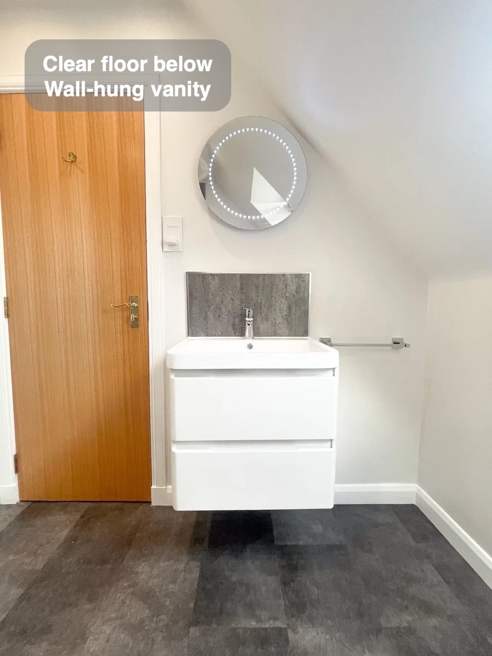 A clearer floor beneath the basin in the completed Dyce bathroom