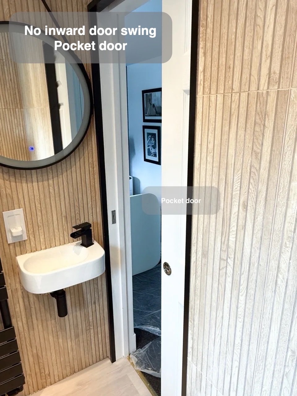 An entrance without a door swing in the completed Ellon bathroom