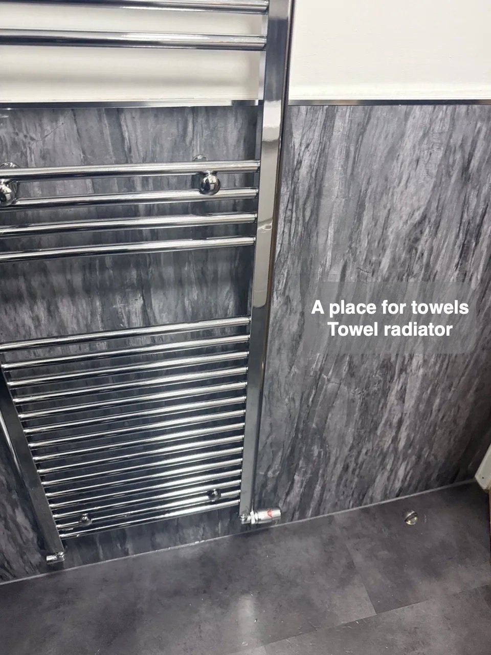 A dedicated place for towels in Aberdeen bathroom