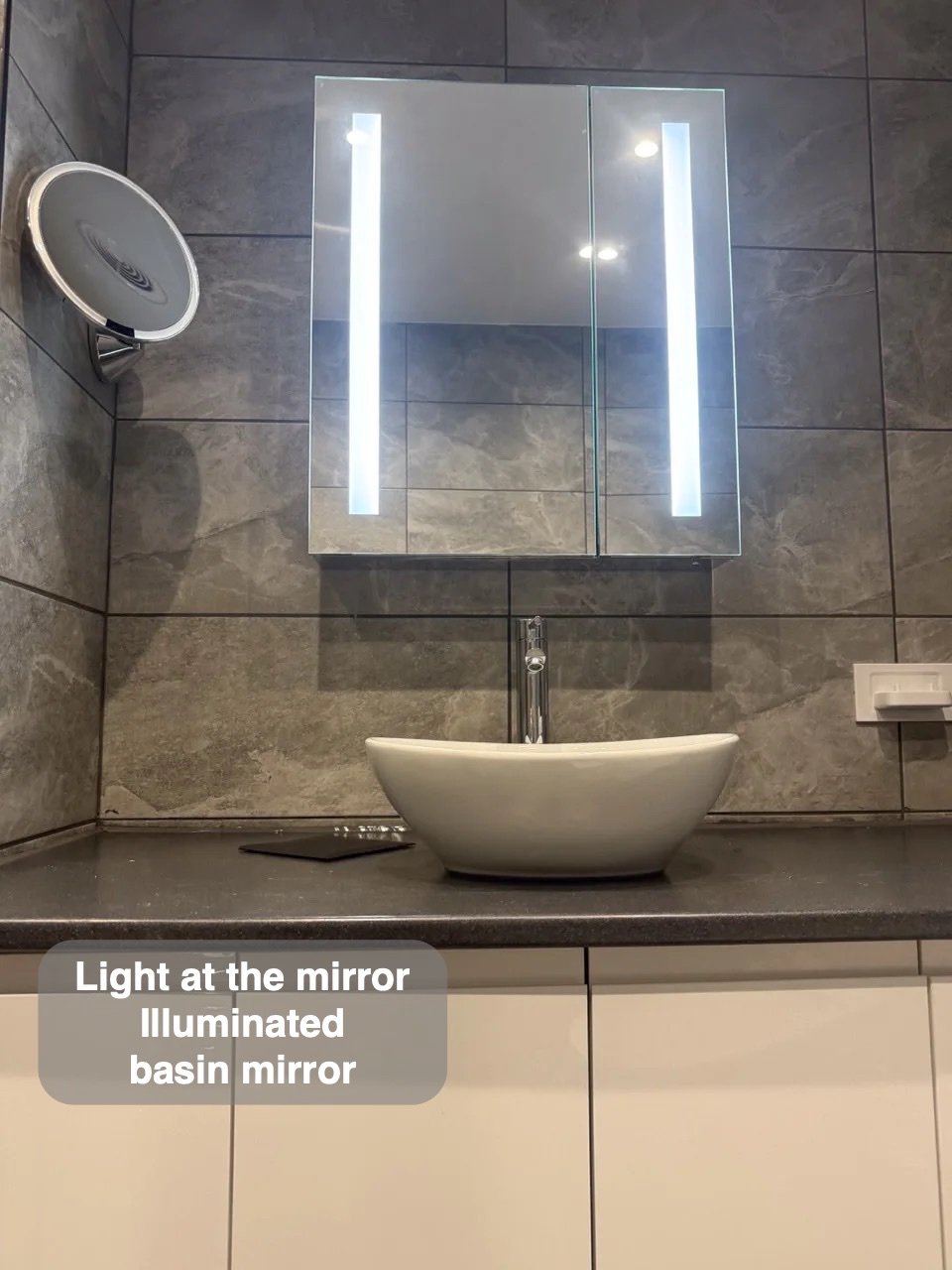 Illuminated basin mirror