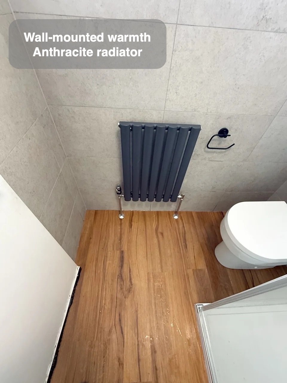 Warm tones and a place for towels in the completed Stoneywood, Aberdeen bathroom