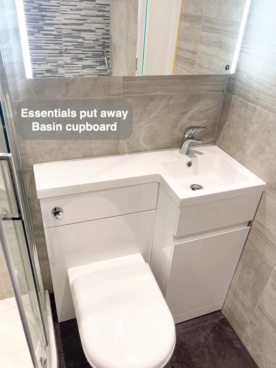 Storage close to the basin in the completed Newtonhill bathroom