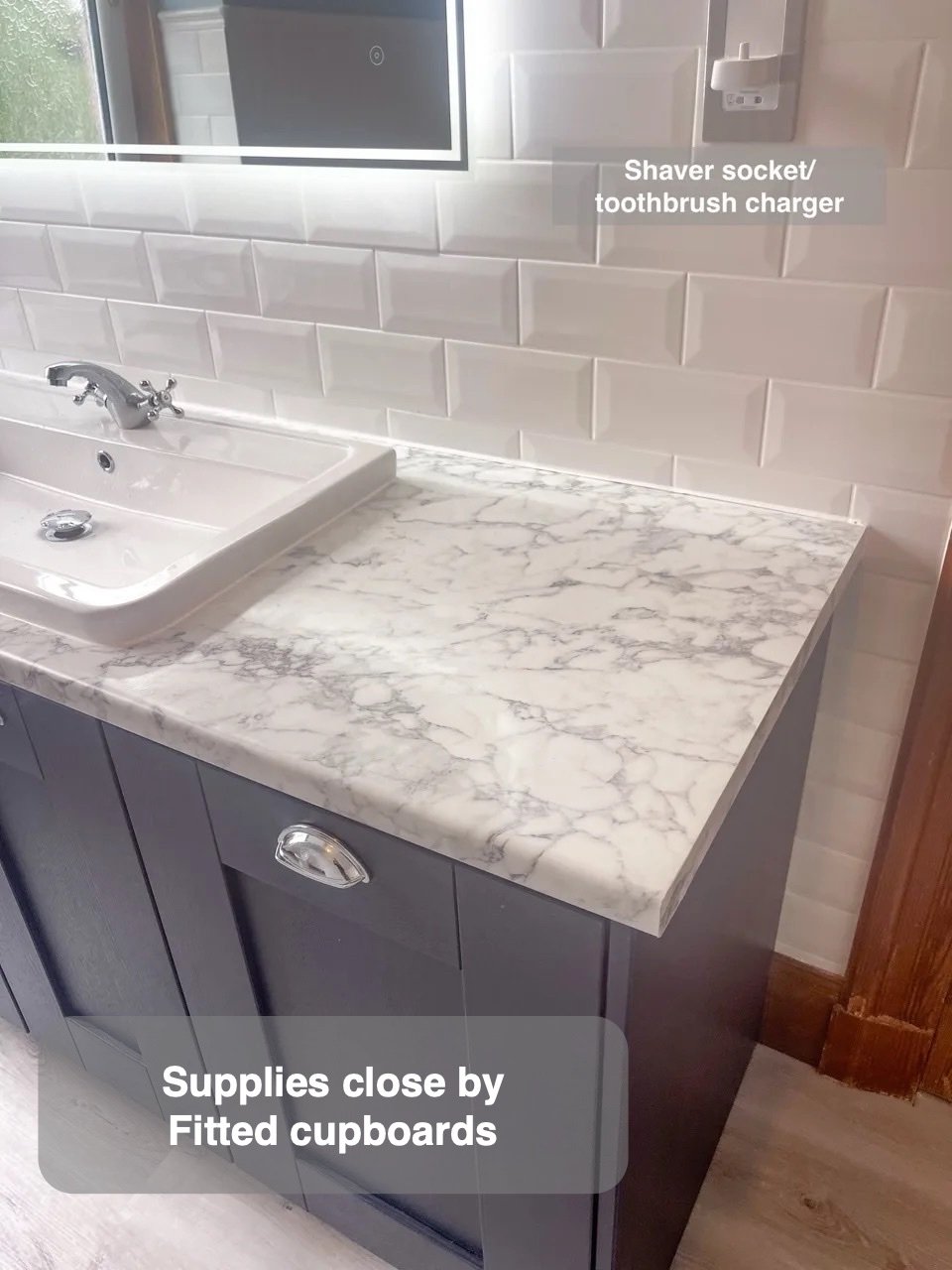Custom cupboard storage beside basin