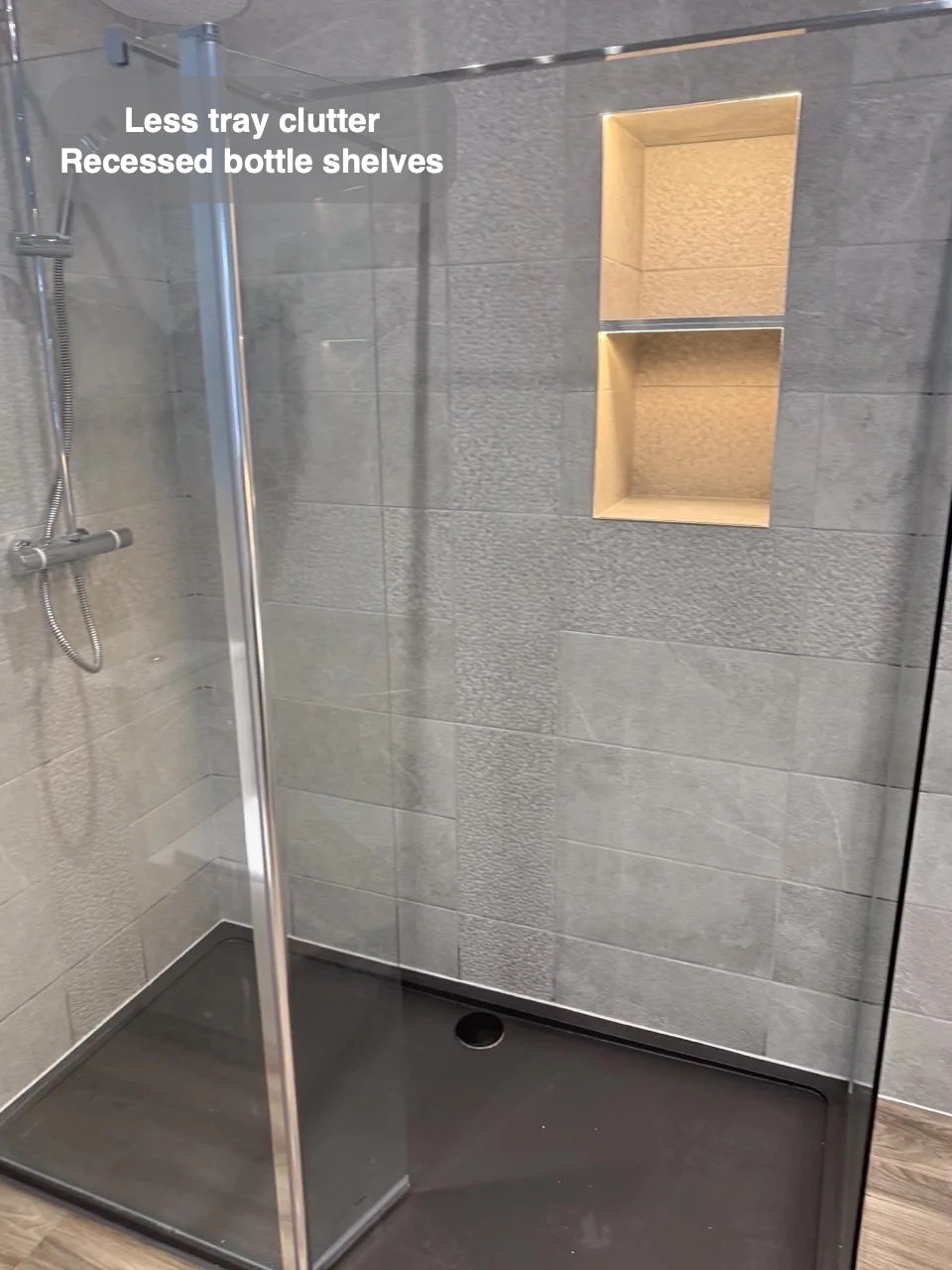 Walk-in shower with recessed storage