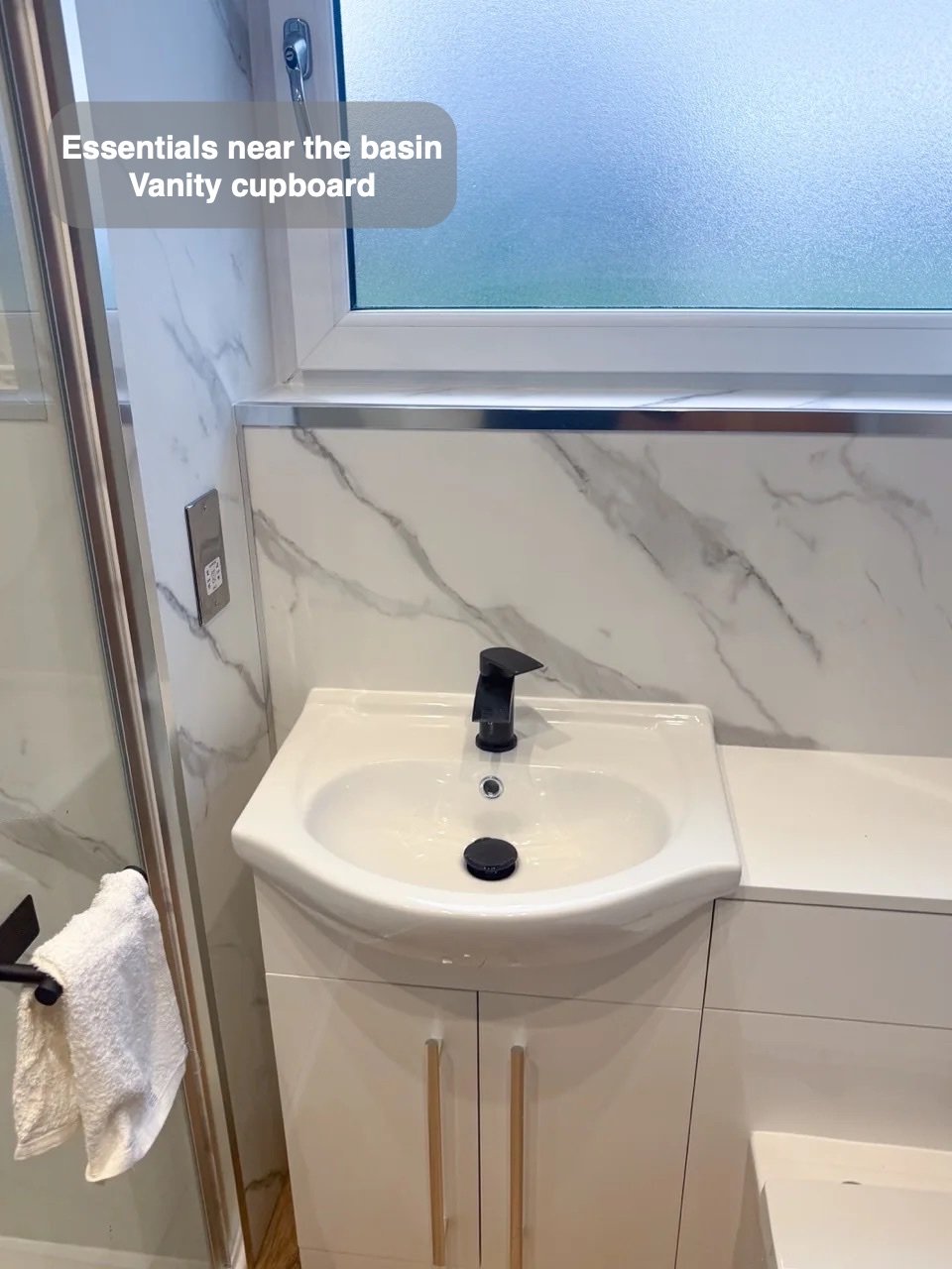 Basin with cupboard storage beneath