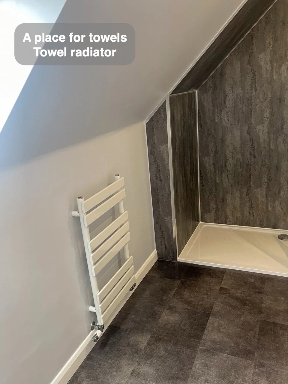Towels have their own place in the completed Dyce bathroom