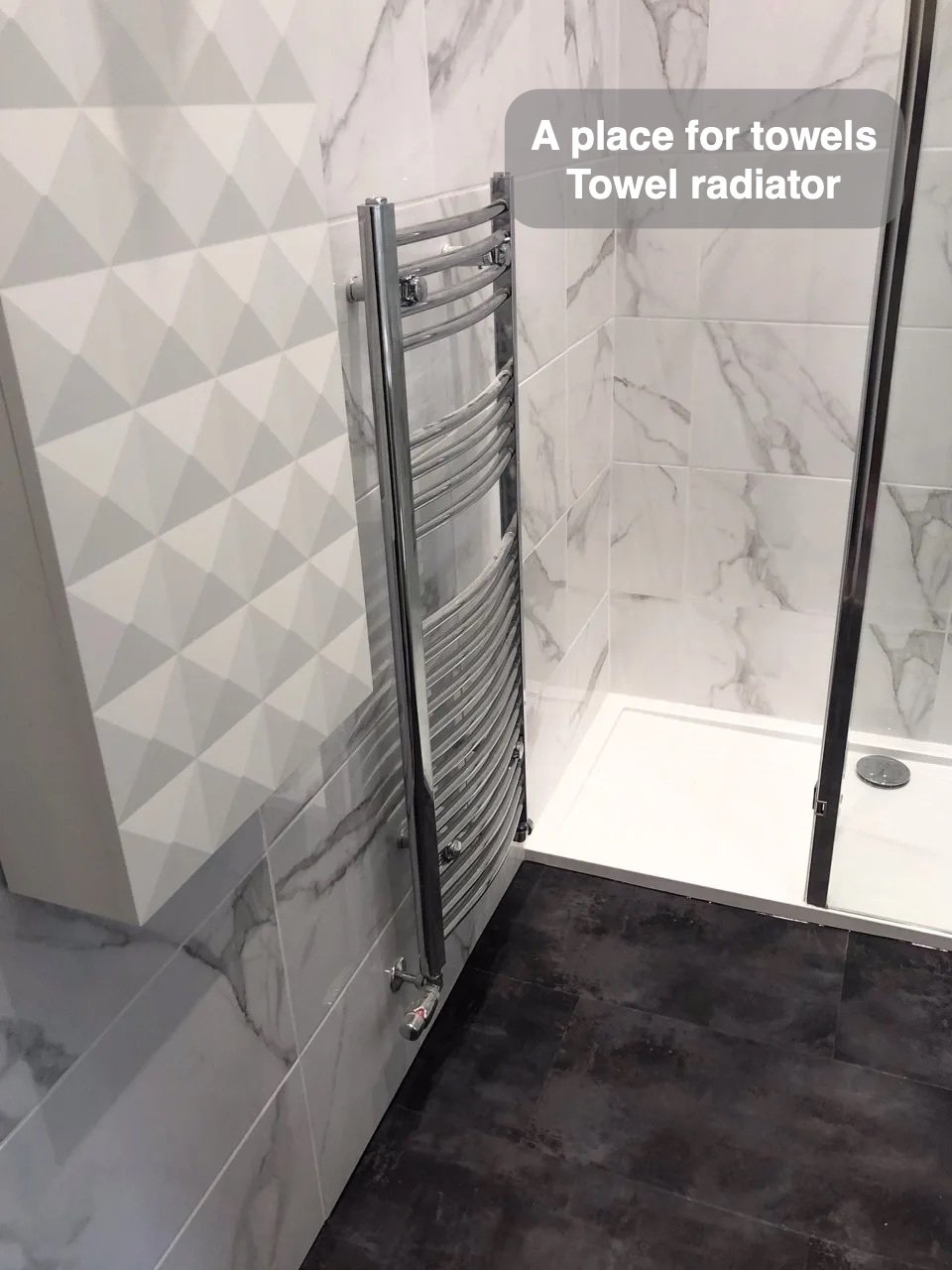 Towels have their own place in the completed Hilton, Aberdeen bathroom